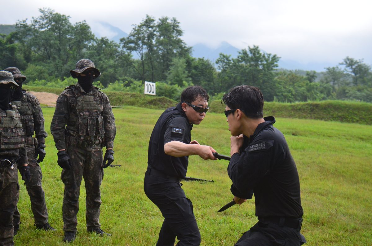 Live knife-defense drill with special forces trainees